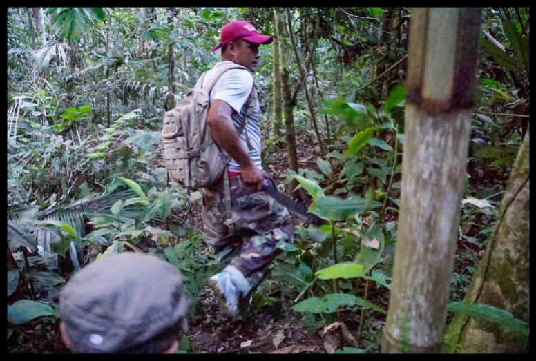 Hacking through the jungle with a machette.