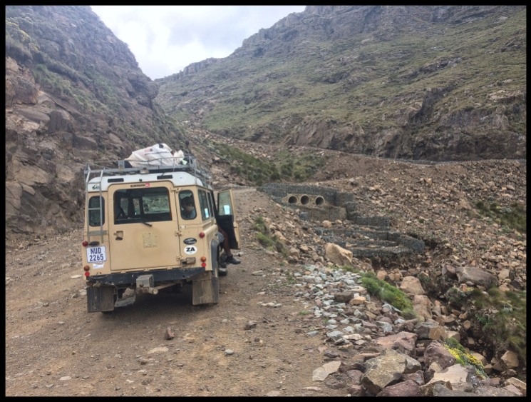 Our vehicle going up the road to Sani pass.